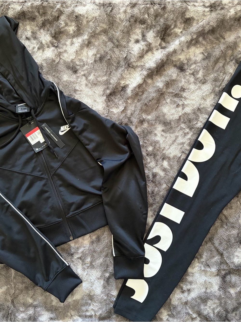 Nike Black Drawstring Hoodie with White Tag Accents
